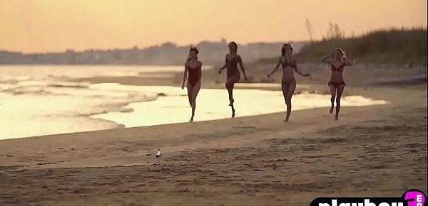  Four perfect models showed perfect tits on the beach